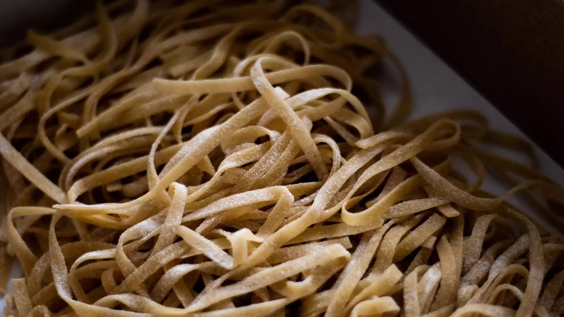 Fresh tagliatelle in a pile